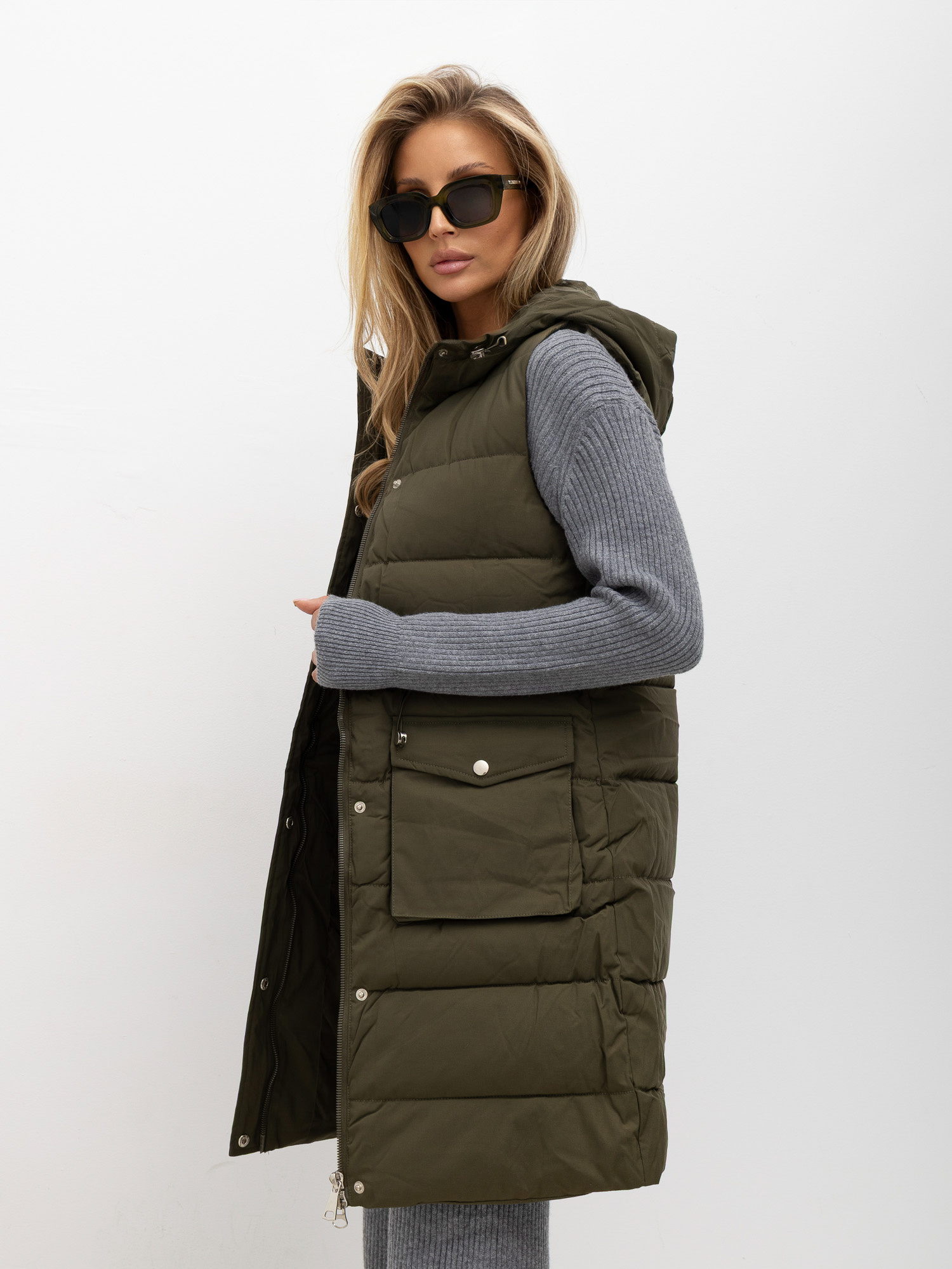 Khaki quilted vest with lining.