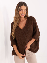 Brown oversized sweater in solid color.
