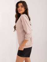 Hurt Beżowa damska bluzka z dżetami na co dzień