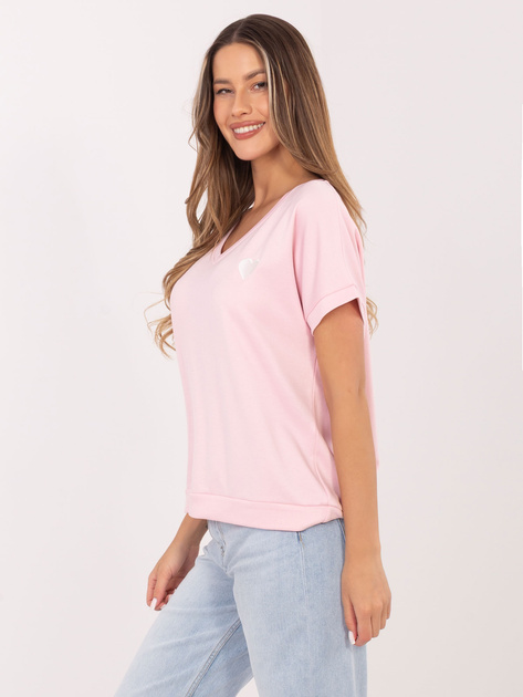 Jasnoróżowa damska bluzka oversize z krótkim rękawem