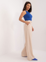 Hurt Jasnobeżowe materiałowe spodnie szwedy z paskiem RUE PARIS