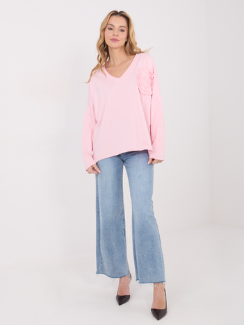 Jasnoróżowa bluzka oversize z długim rękawem