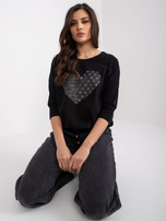 Schwarze Baumwollbluse mit Bindy-Applikation.