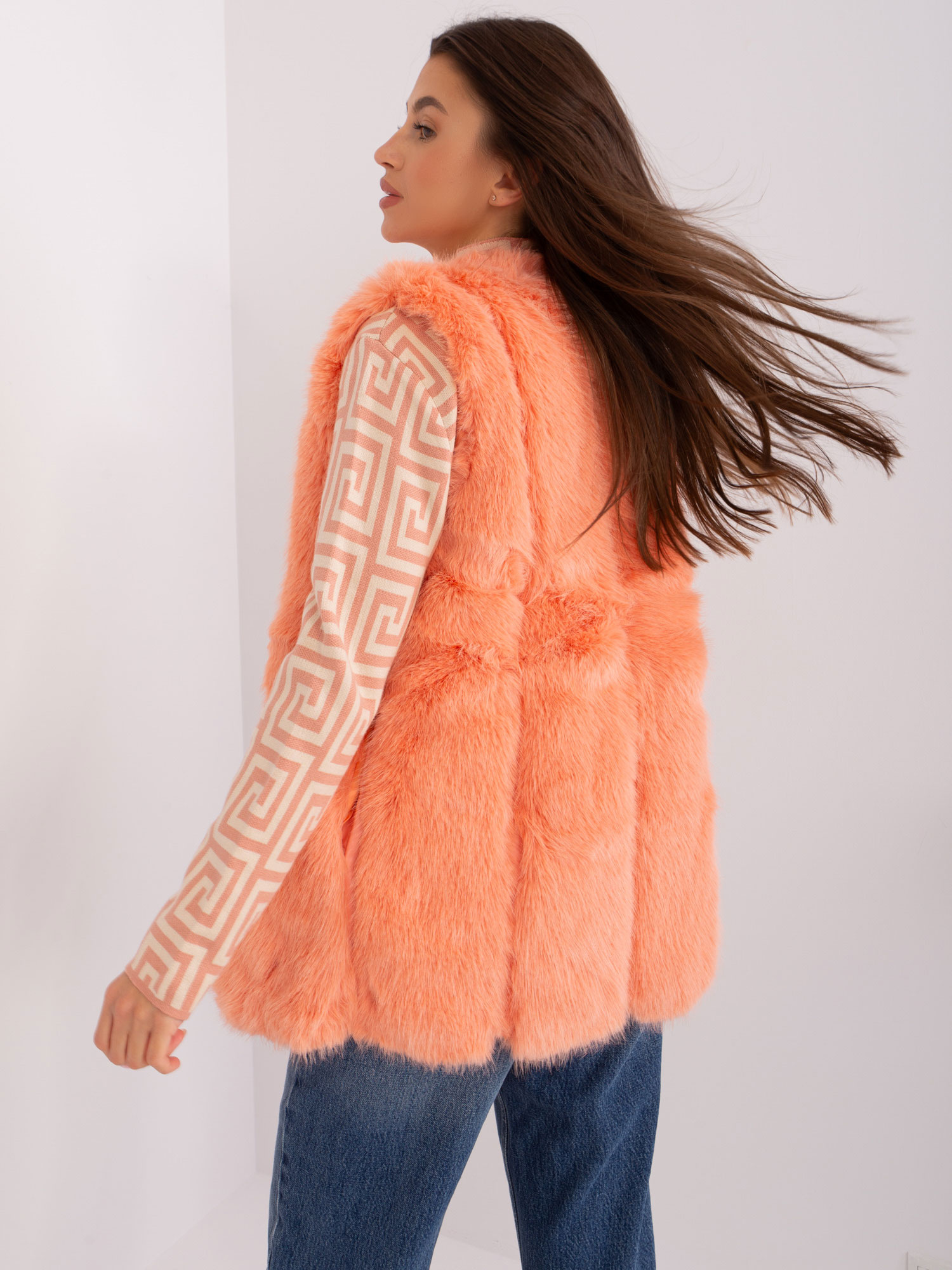 Hurt peach fur vest with lining.
