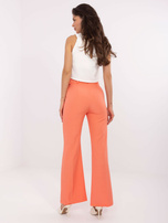 Fluo pomarańczowe spodnie garniturowe z kieszeniami