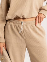 Beige corduroy set with cuffs.