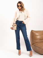 Light beige fitted ribbed sweater.