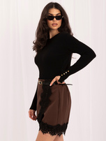 Black fitted sweater with split sleeves.