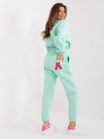 Hurt Miętowo-fluo różowy komplet dresowy z literą A