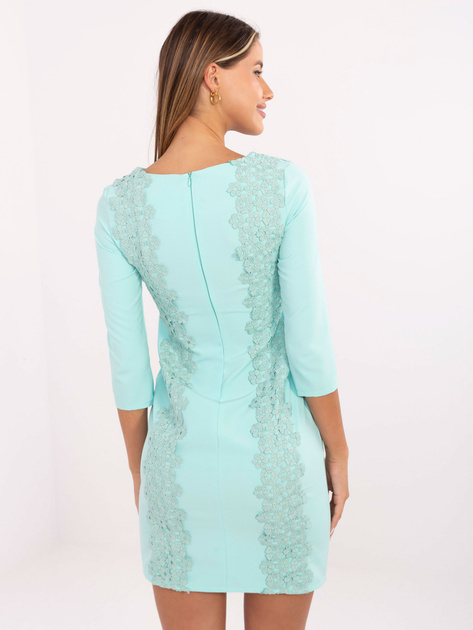 Hurt Miętowa sukienka koktajlowa z kwiatową aplikacją