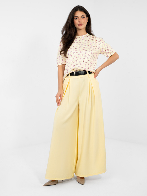 Pastelowa żółta damska bluzka w kwiaty