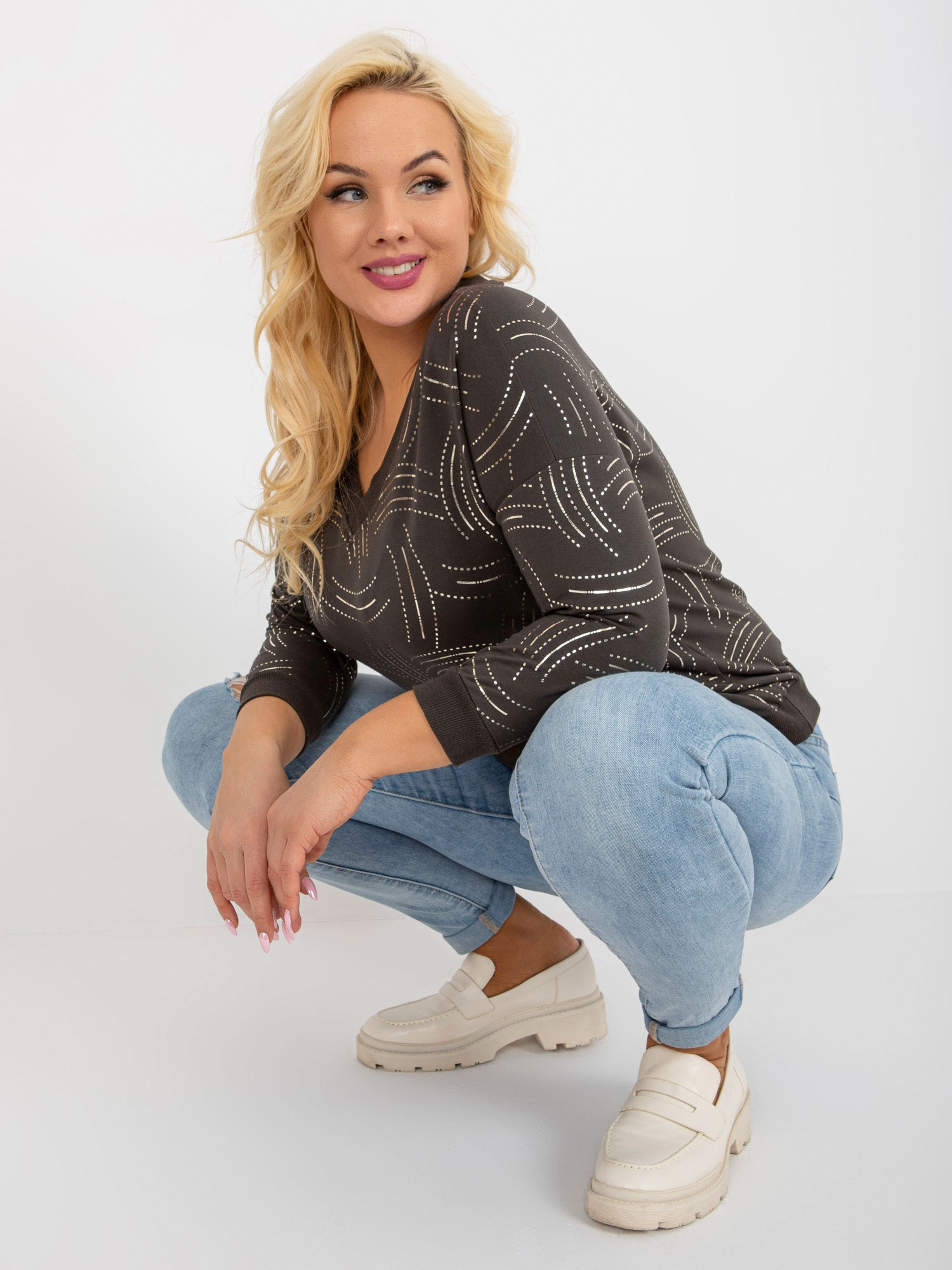 Hurt women's plus size khaki with print and V-neck.