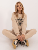 Hurtownia Beżowa damska bluza oversize z printem