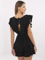 Black muslin jumpsuit with ruffles.