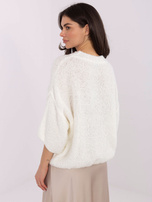 Ecru oversized boucle sweater.