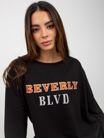 Hurtownia Czarna bawełniana bluza z nadrukiem