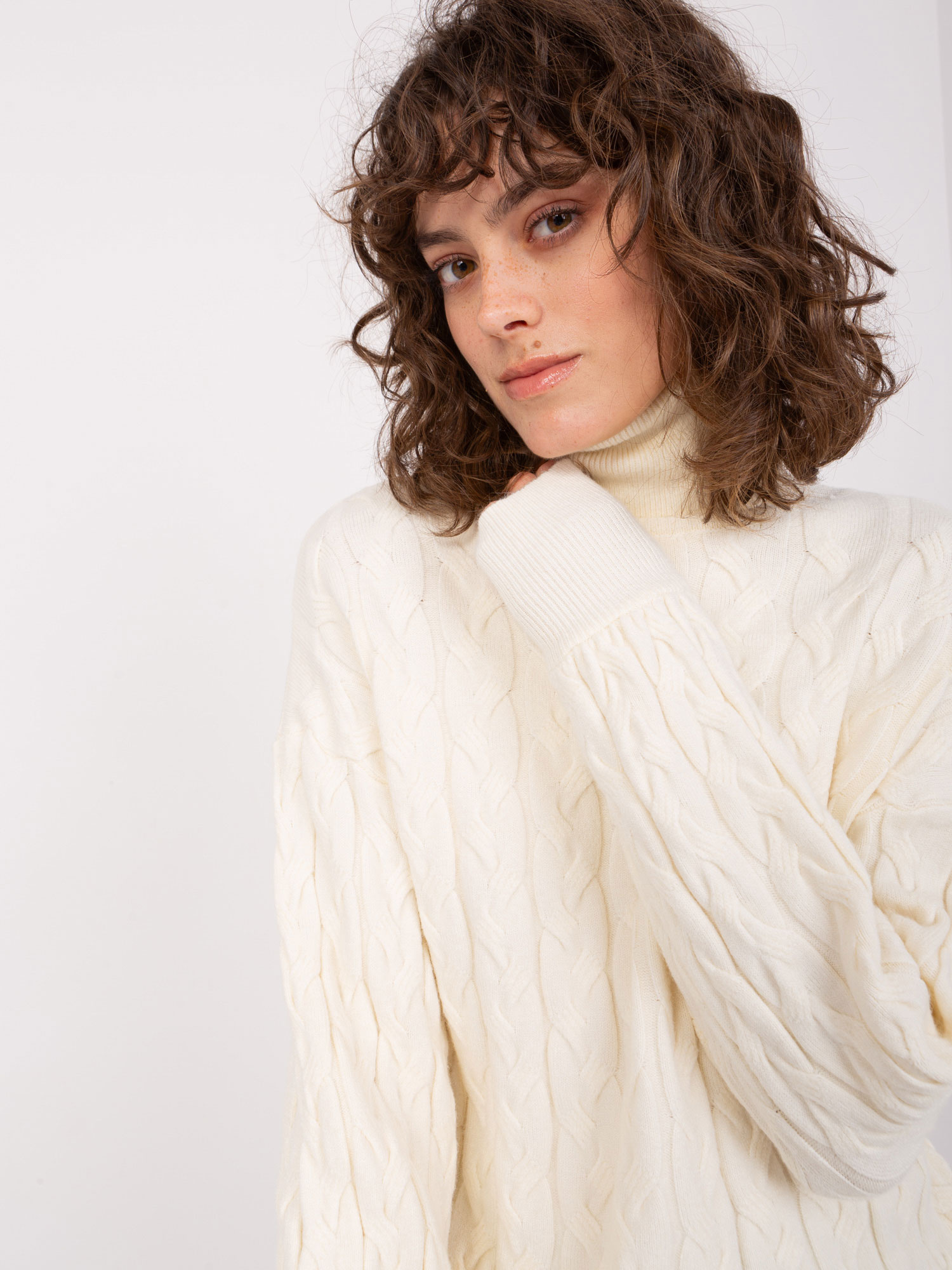 Ecru women's turtleneck sweater with braids