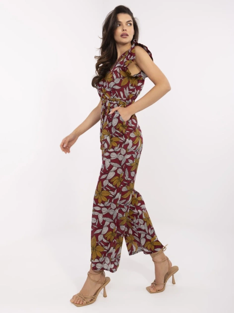Bordowy kombinezon w tropikalny wzór Casja