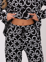 Hurt Czarny dwuczęściowy komplet damski we wzory