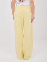 Pastelowe żółte dresowe spodnie z kieszeniami RUE PARIS 