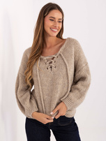 Beige women's sweater with corset lacing.