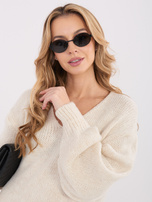 Jasnobeżowa sweterkowa sukienka oversize