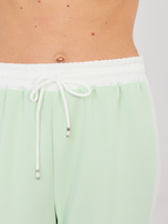 Pistacjowy kolorowy komplet z szerokimi spodniami RUE PARIS 