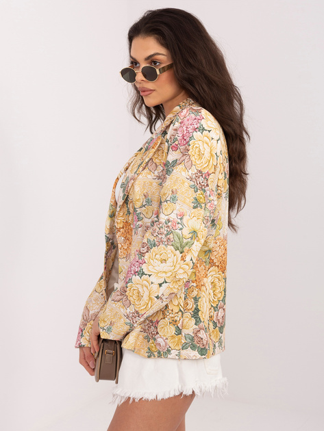 Żółta damska marynarka z ozdobnymi guzikami