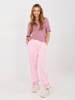 Jasnoróżowe dresowe spodnie z kokardkami