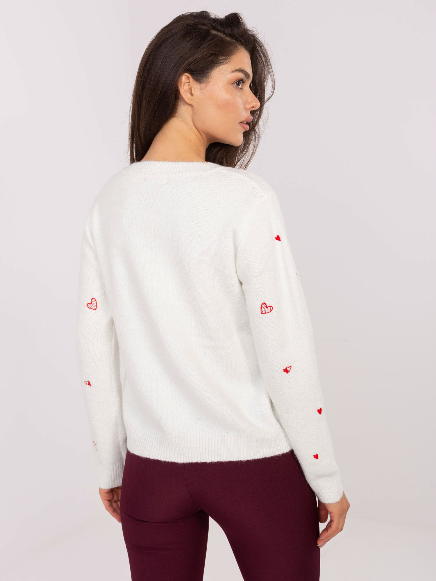 Ecru offen gestrickter Pullover mit Wolle.