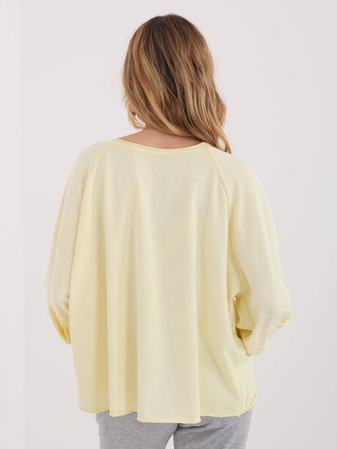 Jasnożółta bluzka oversize z bufiastym rękawem