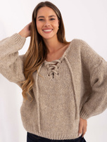 Beige women's sweater with corset lacing.