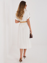Brown summer dress with a woven belt.