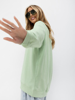 Pistazienfarbener Oversize-Sweatshirt aus Baumwolle.