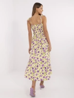 Light yellow summer dress with tie straps.
