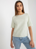 Hurt Light green blouse for special occasions with a round neckline.