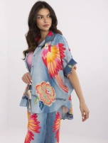 Blue women's shirt with colorful print.