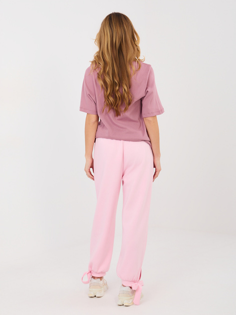Jasnoróżowe dresowe spodnie z kokardkami