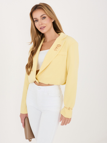 Jasnożółta krótka marynarka z broszką 