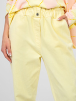 Pastelowe żółte sztruksowe spodnie z kieszeniami 