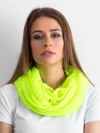 Fluoreszierendes gelbes Tuch mit Nieten.
