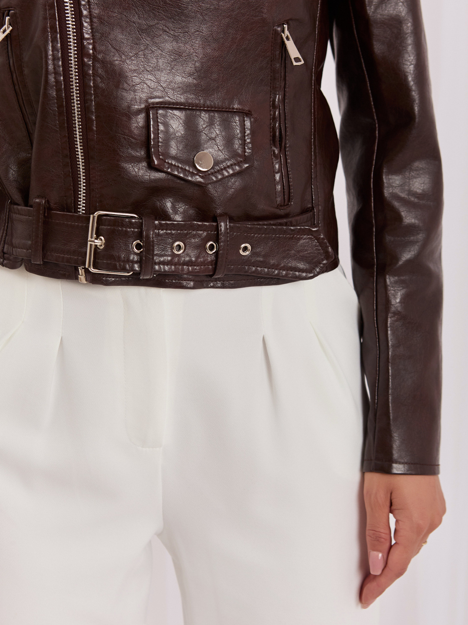Dark brown women's faux leather biker jacket.