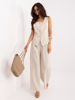 Jasnobeżowy elegancki komplet z szerokimi spodniami