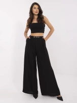 Black summer palazzo pants with a thin belt.