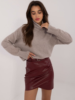 Hurtownia Beżowy luźny sweter z długim rękawem i golfem