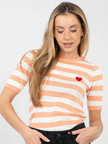 Pomarańczowy sweter z haftem w kształcie serca