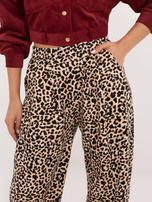 Hurtownia Beżowo-czarne długie spodnie w panterkę