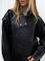 Black women's jacket made of faux leather with a collar.