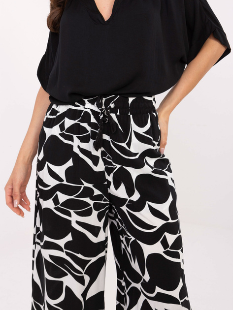 Czarne szerokie spodnie na lato SUBLEVEL