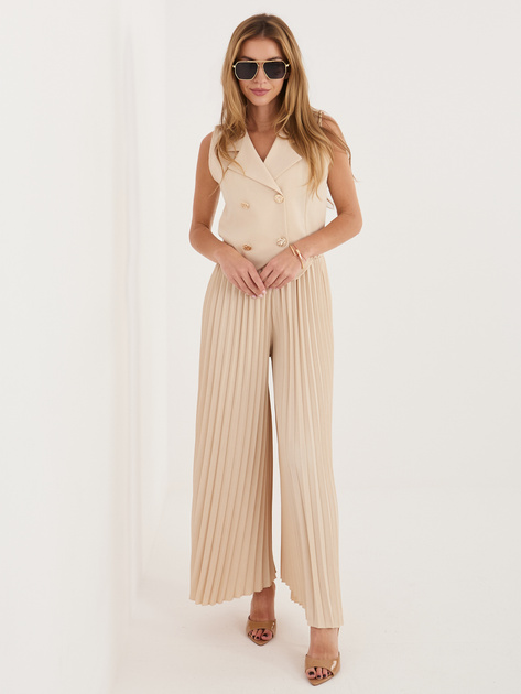 Beżowy damski garnitur z szerokimi spodniami